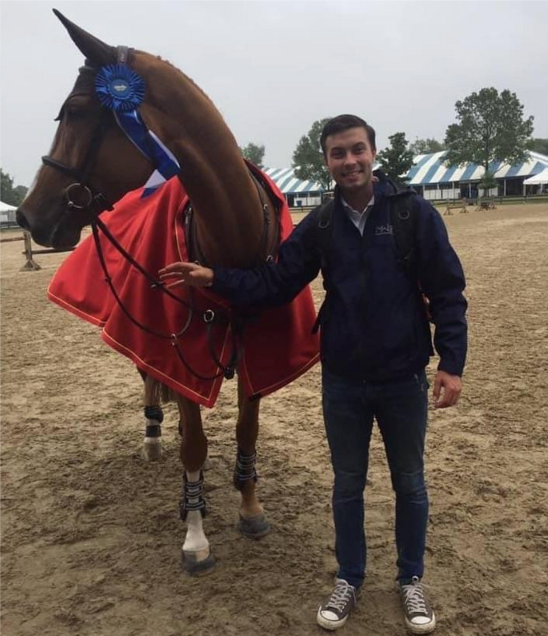 Owen Rogers with McLain Ward's horse, Contagious